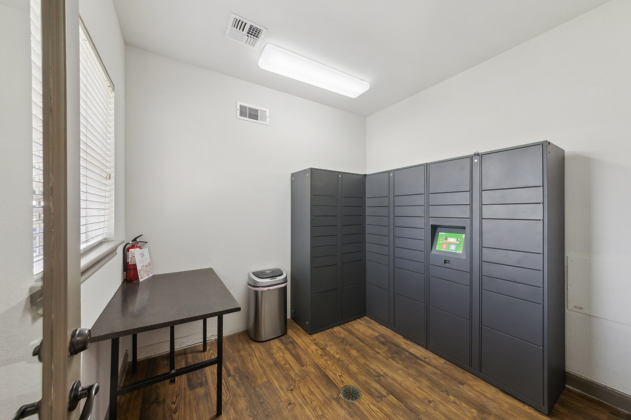 a room with a lockers and cabinets at The  Boulevard at Deer Park